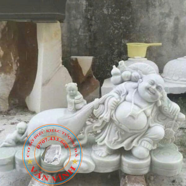 Tượng Phật Di Lặc kéo bao tiền bằng đá cẩm thạch nguyên khối cao 55 cm (DL06)